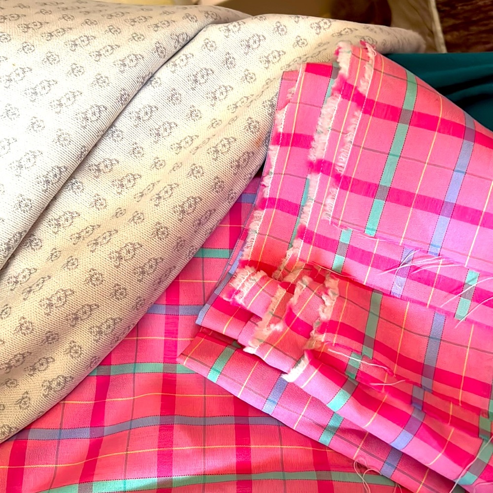 4  yards  pink cotton blend type fabric. Uncut except  off bolt + 1yd polyester